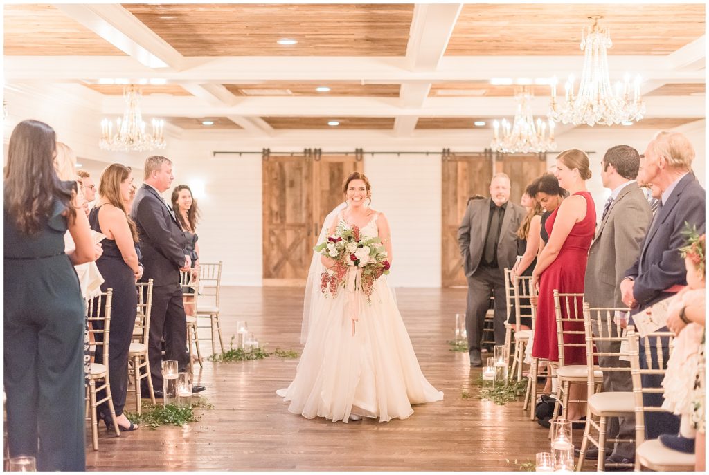 bride walks down the aisle solo