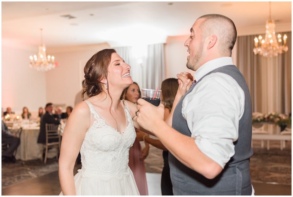 bride and groom dancing