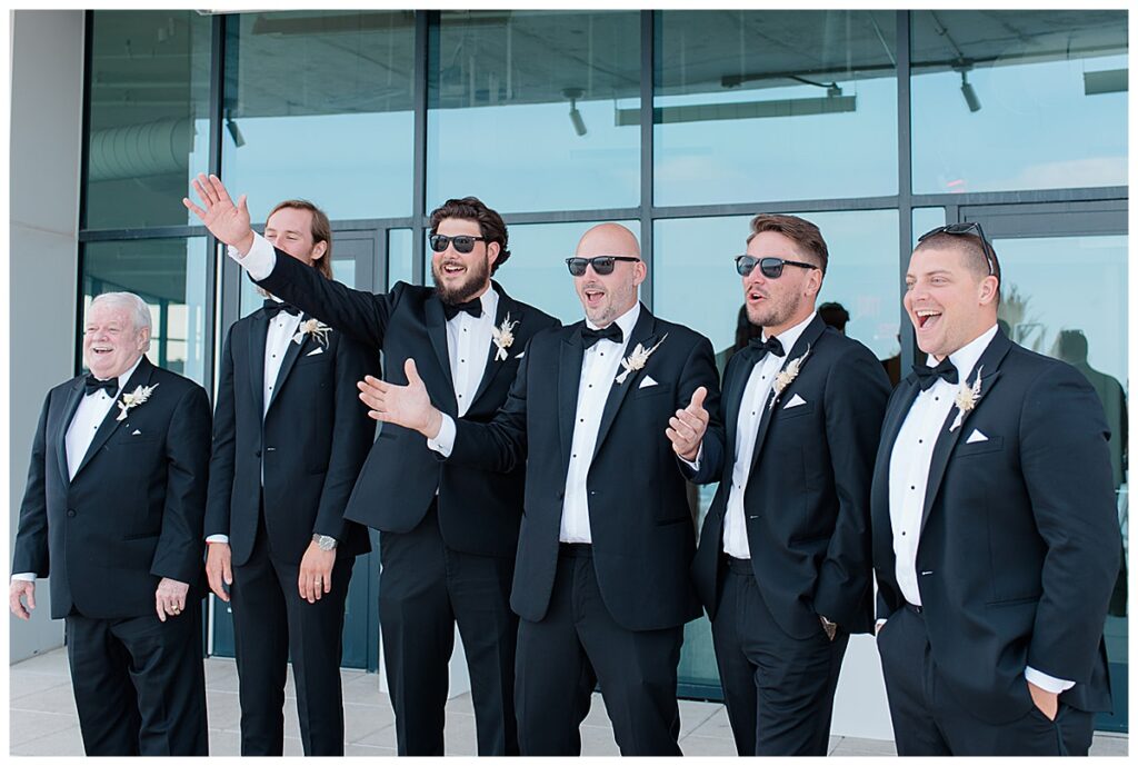 bride's first look with groomsmen