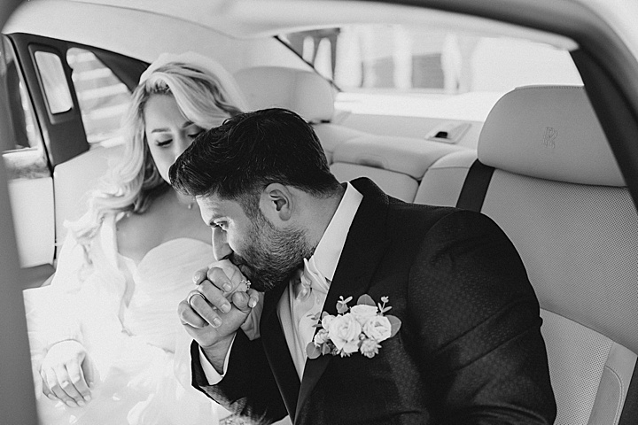 bride and groom in rolls royce