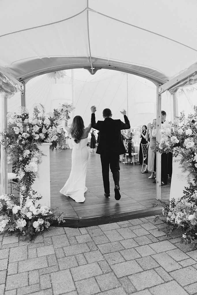 bride and groom enter reception