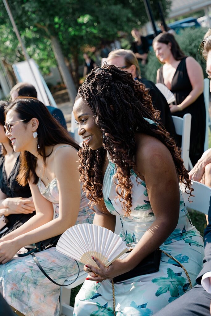 wedding guest with fan
