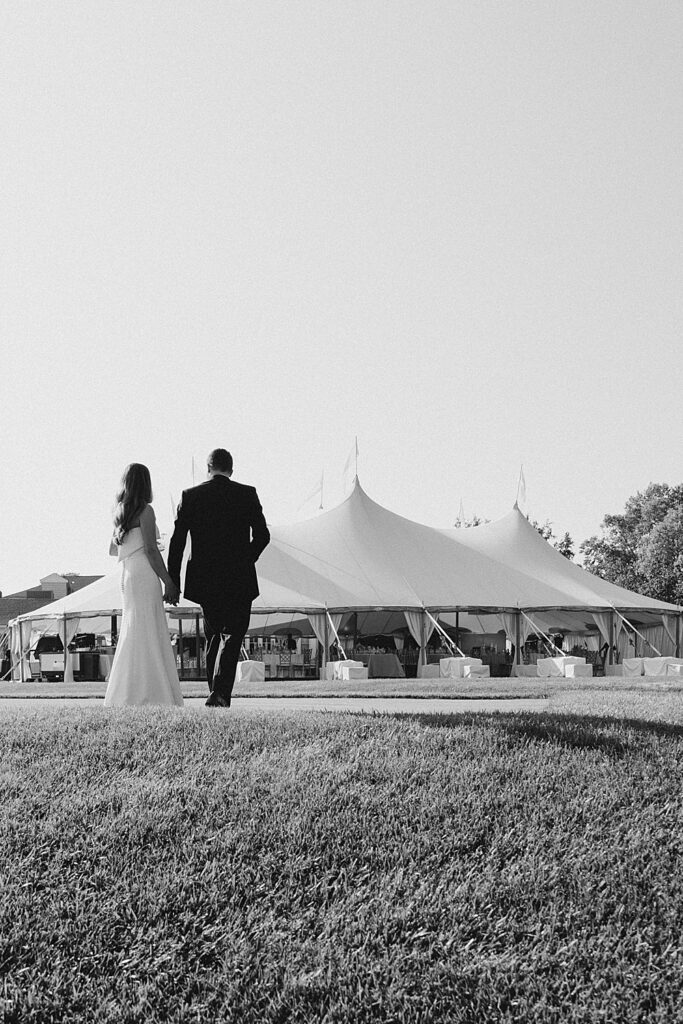 bride and groom with tent