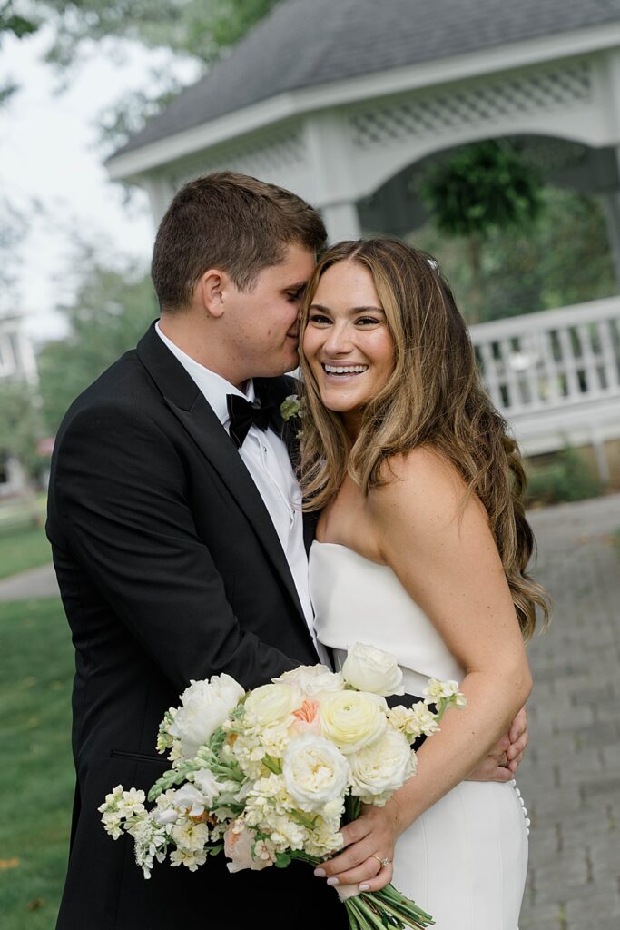 bride and groom in spring lake