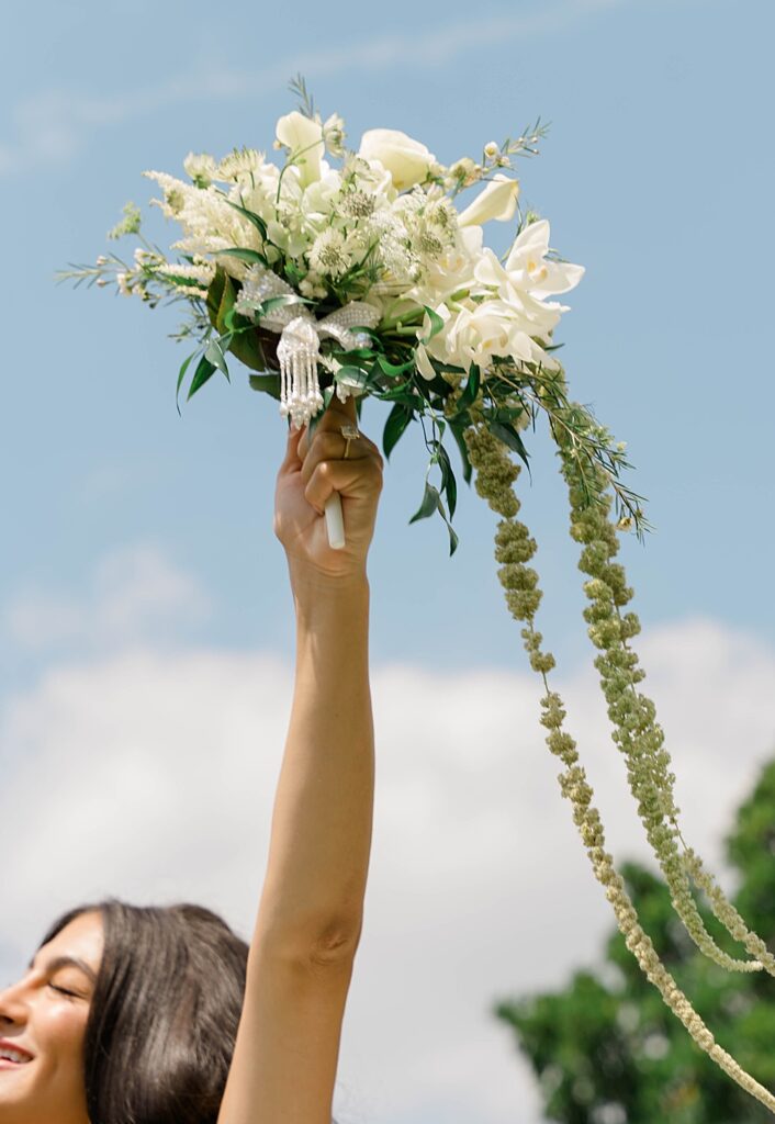 bride bouquet in the air