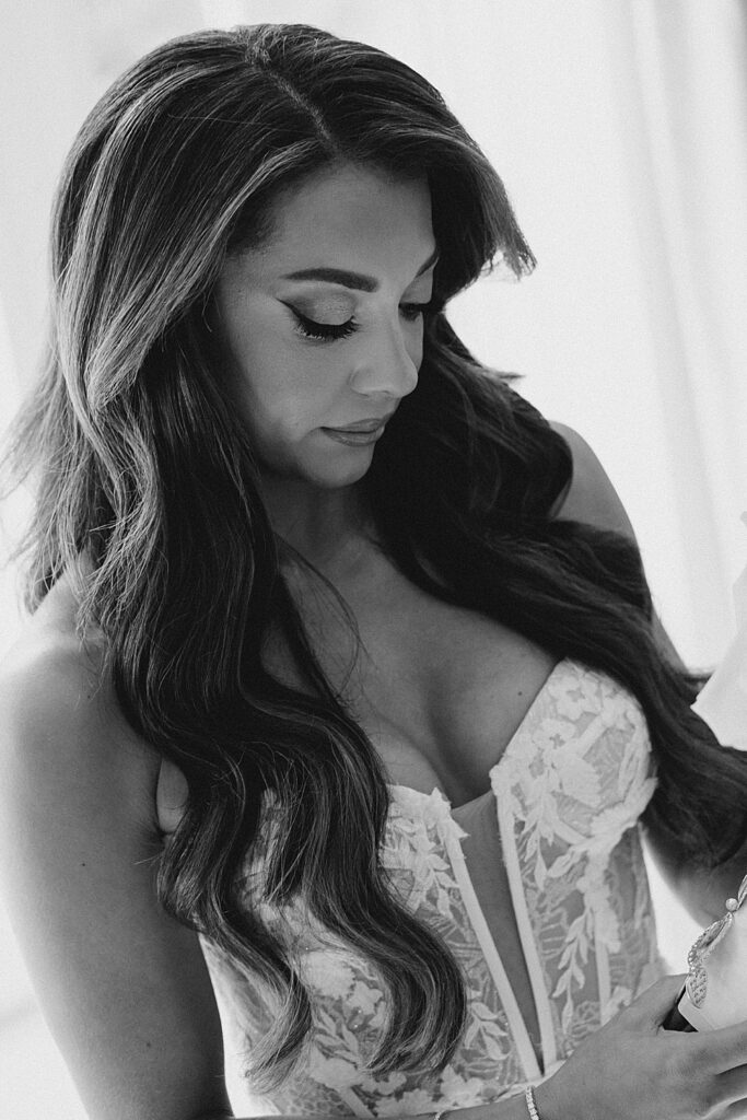 black and white of bride in lace dress