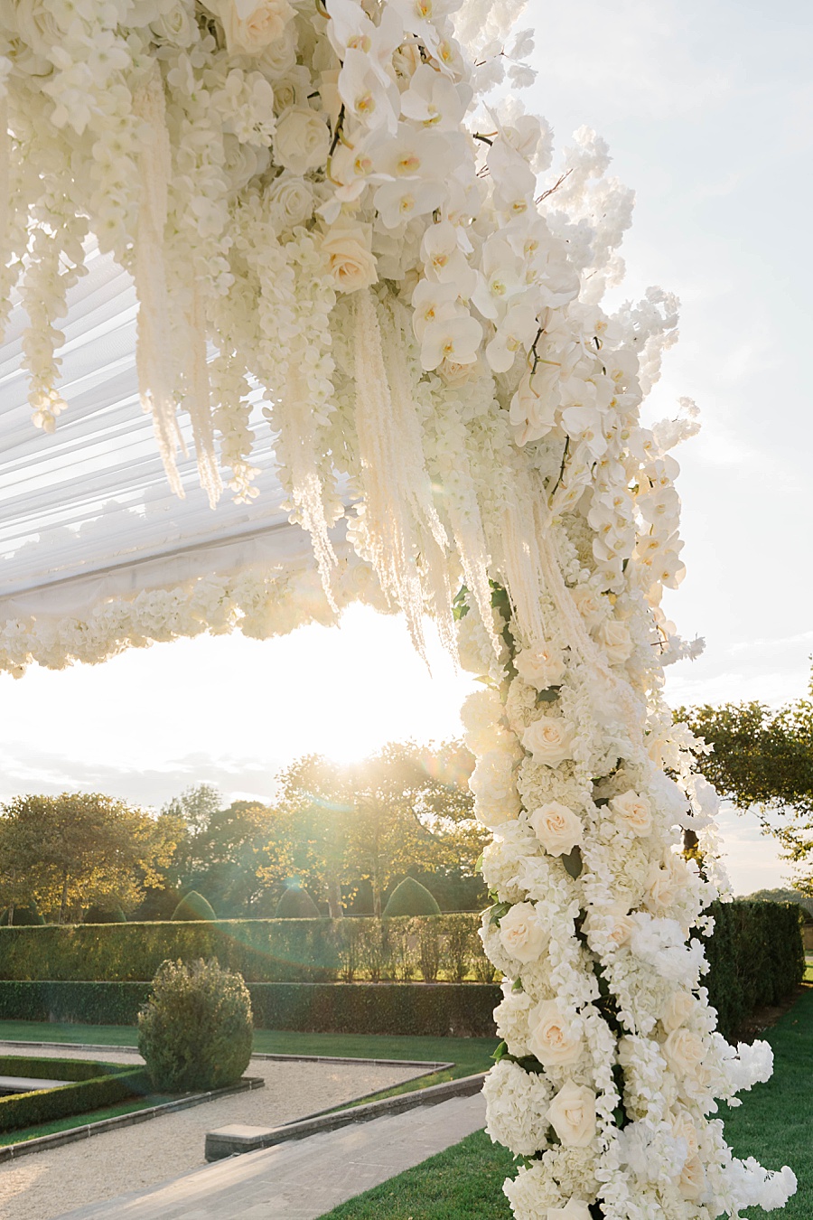 white wedding chuppa at sundown