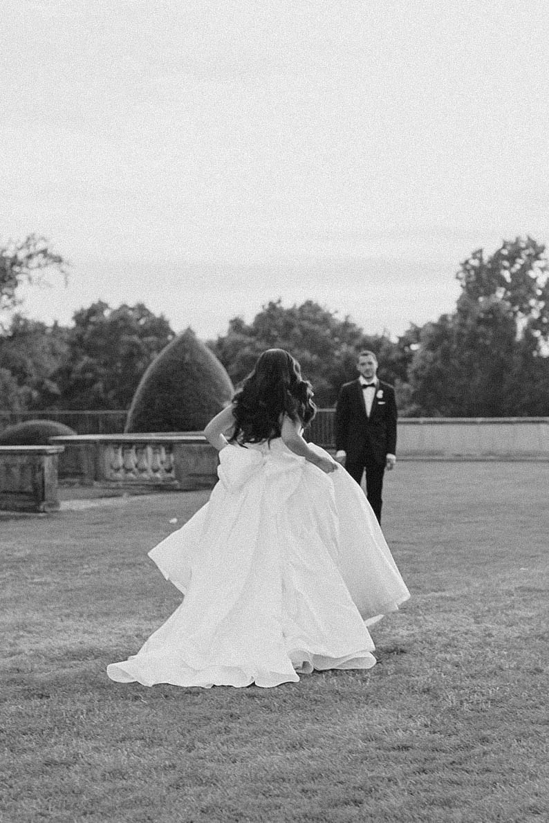 bride running toward groom