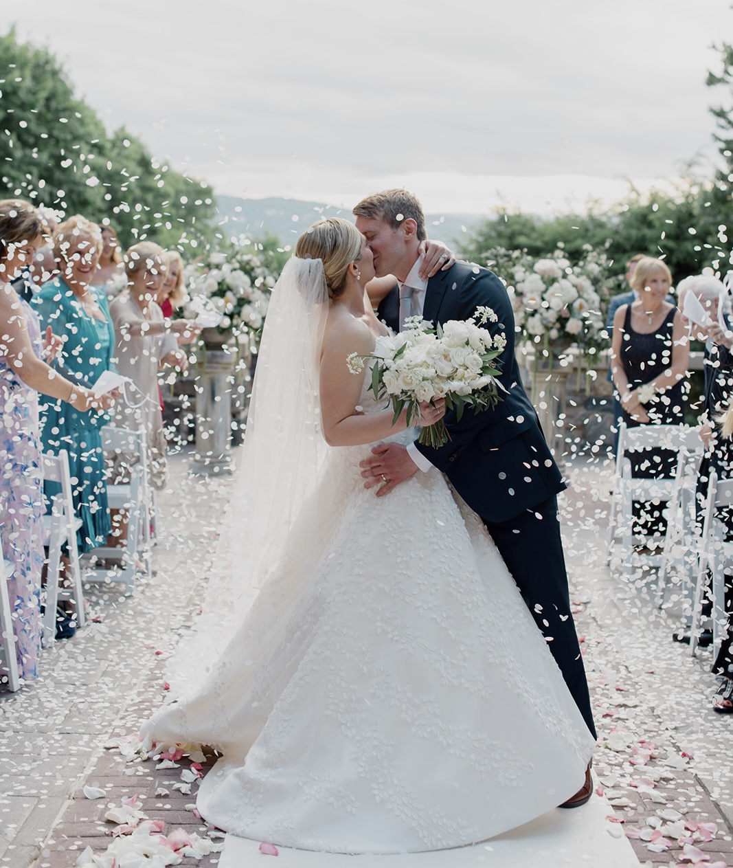 wedding confetti kiss photo