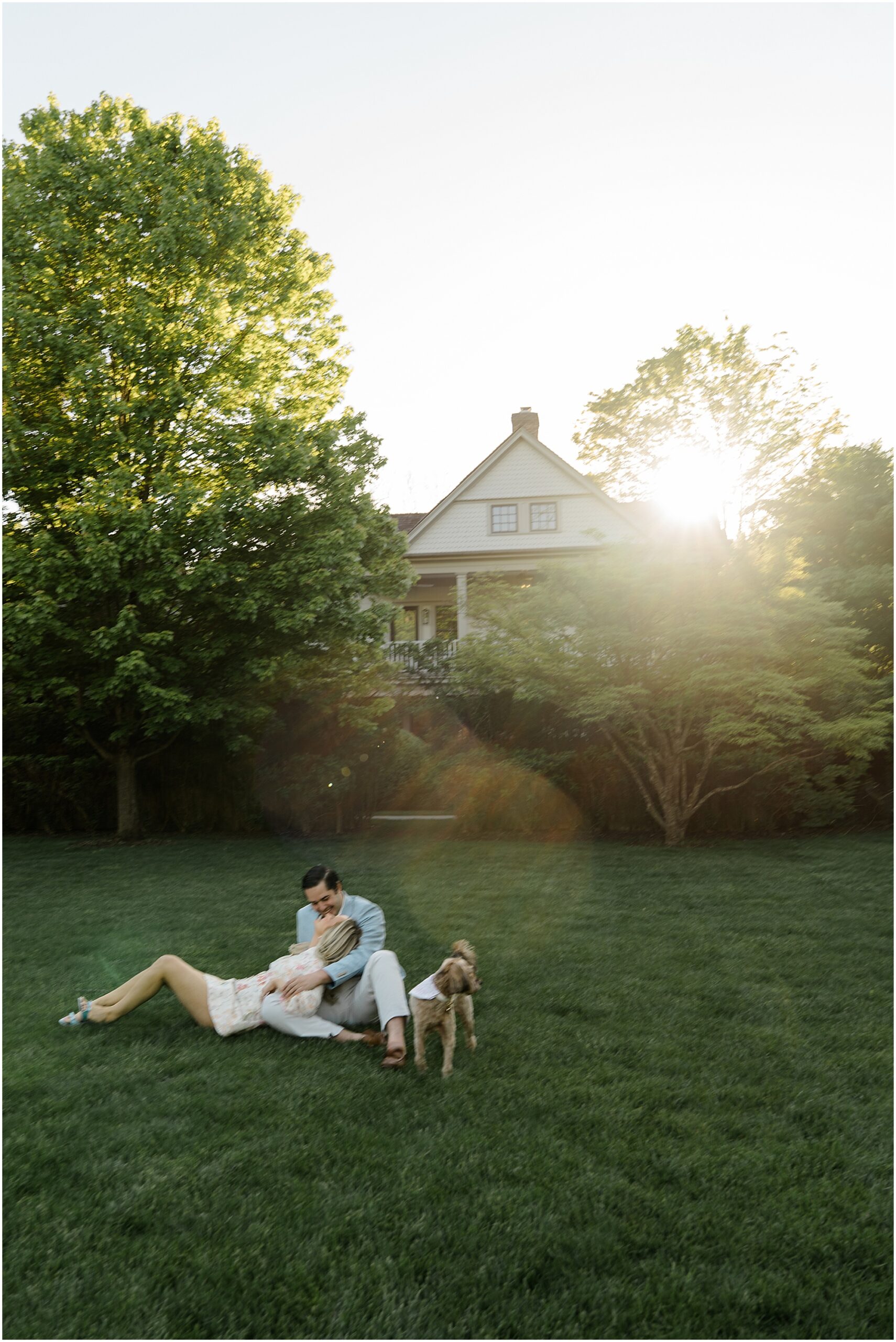 bride and groom to be on front lawn