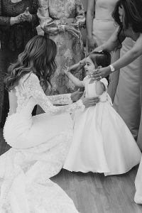 bride in long sleeve lace wedding dress